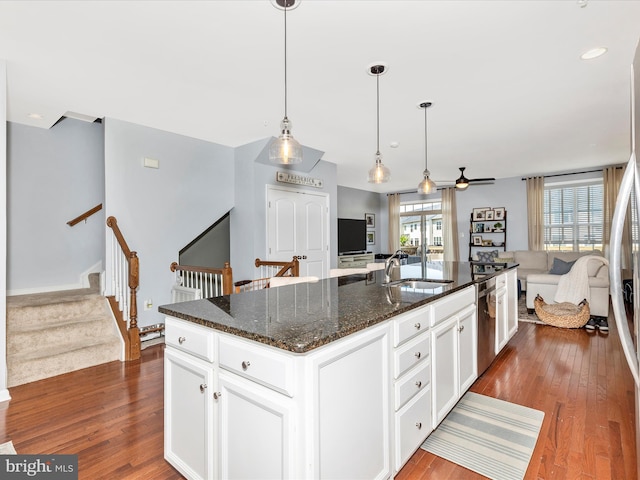 6540 Newton Dr, Frederick, MD 21703 - kitchen with a sink, open floor plan, and dark wood finished floors