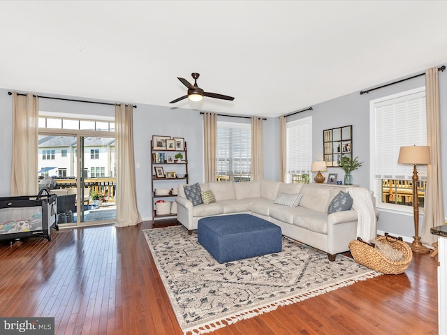 6540 Newton Dr, Frederick, MD 21703 - living area featuring ceiling fan, healthy amount of natural light, and dark wood finished floors