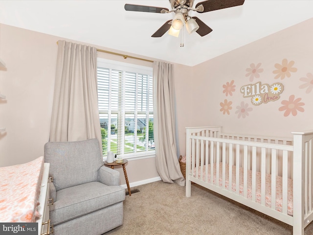 6540 Newton Dr, Frederick, MD 21703 - carpeted bedroom with a nursery area, baseboards, and a ceiling fan