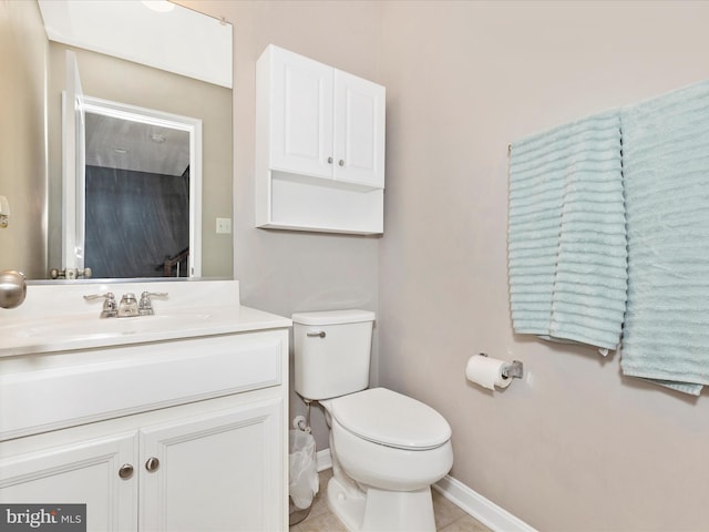 6540 Newton Dr, Frederick, MD 21703 - half bathroom with toilet, vanity, baseboards, and tile patterned floors