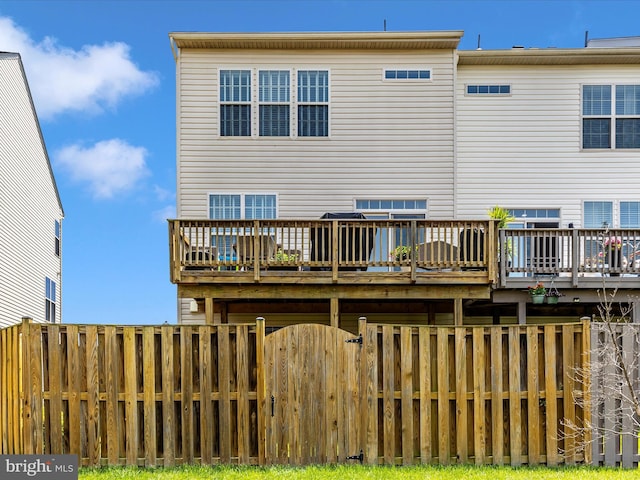 6540 Newton Dr, Frederick, MD 21703 - rear view of property with a deck and a gate