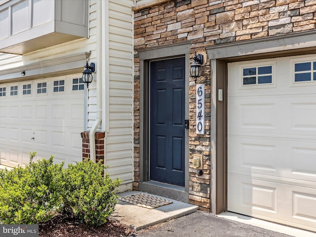 6540 Newton Dr, Frederick, MD 21703 - doorway to property with stone siding