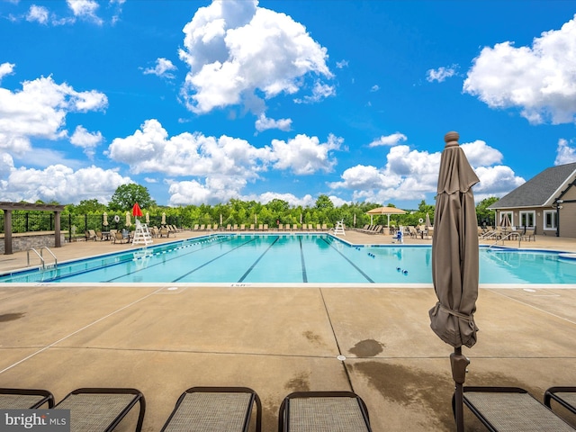 6540 Newton Dr, Frederick, MD 21703 - community pool featuring a patio