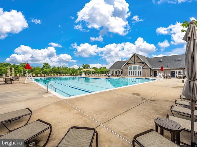 6540 Newton Dr, Frederick, MD 21703 - community pool featuring a patio area