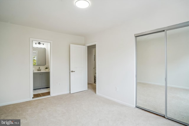 7 Supreme Ct Unit 23-4, Gaithersburg, MD 20878 - unfurnished bedroom featuring carpet, a closet, ensuite bath, and baseboards