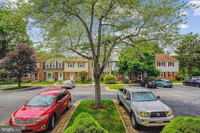 7 Supreme Ct Unit 23-4, Gaithersburg, MD 20878 - view of asphalt road with curbs and a residential view