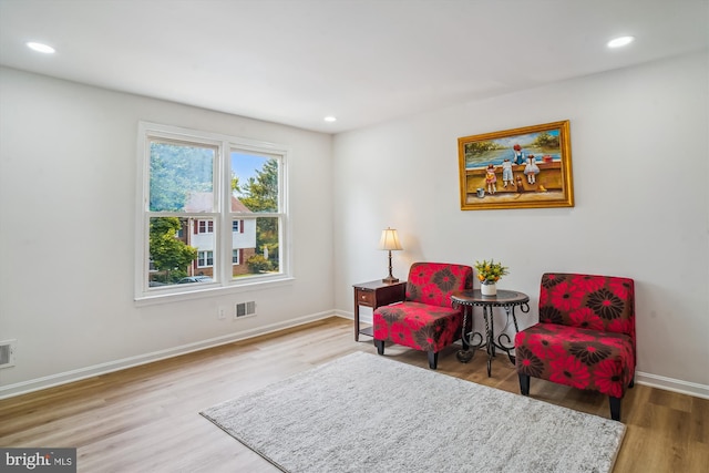7 Supreme Ct Unit 23-4, Gaithersburg, MD 20878 - living area featuring wood finished floors, recessed lighting, and baseboards