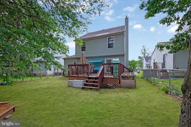 26 Juniper Ave, Somerdale, NJ 08083 - rear view of property with a deck and a chimney