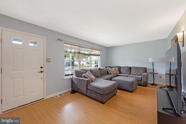 26 Juniper Ave, Somerdale, NJ 08083 - living room featuring light wood-type flooring and baseboards
