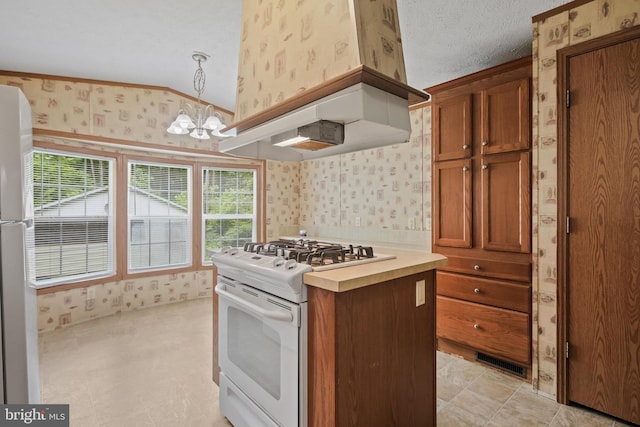 2519 Shureslanding Rd, Darlington, MD 21034 - kitchen with white appliances, wallpapered walls, custom range hood, a chandelier, and brown cabinetry