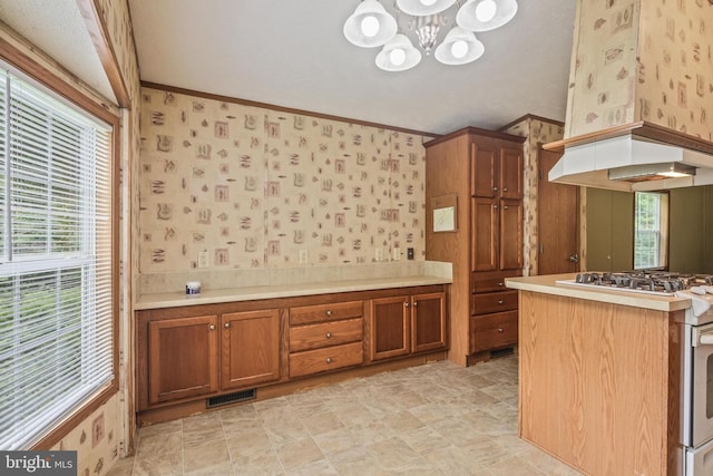 2519 Shureslanding Rd, Darlington, MD 21034 - kitchen featuring premium range hood, brown cabinetry, wallpapered walls, a chandelier, and light countertops