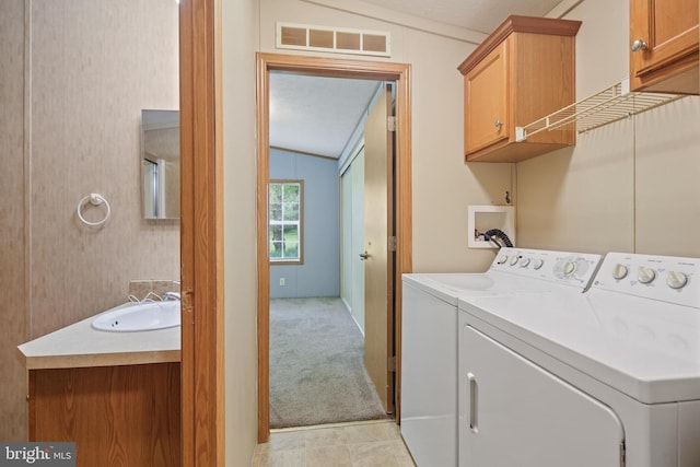 2519 Shureslanding Rd, Darlington, MD 21034 - laundry room with independent washer and dryer, light carpet, cabinet space, and light tile patterned floors