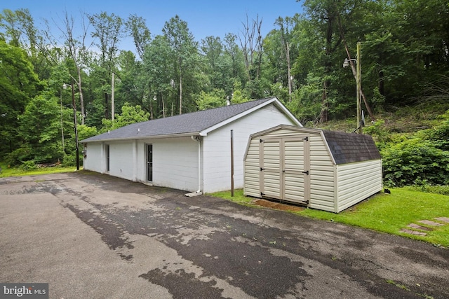 2519 Shureslanding Rd, Darlington, MD 21034 - garage featuring a storage shed and a forest view