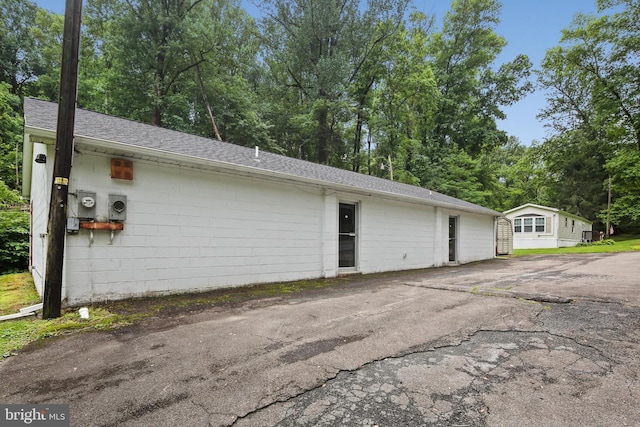 2519 Shureslanding Rd, Darlington, MD 21034 - garage featuring view of wooded area