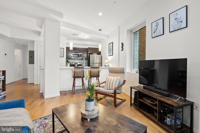 329 Rhode Island Ave NE Unit 104, Washington, DC 20002 - living area with recessed lighting, light wood finished floors, baseboards, and electric panel