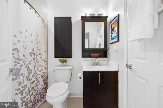 329 Rhode Island Ave NE Unit 104, Washington, DC 20002 - full bathroom featuring vanity, toilet, a shower with curtain, and tile patterned floors