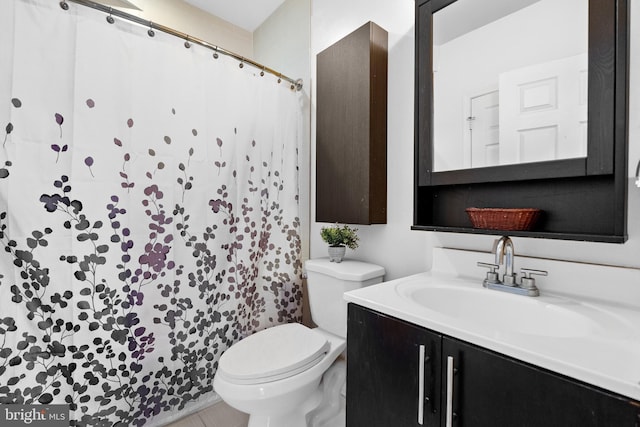 329 Rhode Island Ave NE Unit 104, Washington, DC 20002 - bathroom featuring toilet, vanity, and a shower with shower curtain