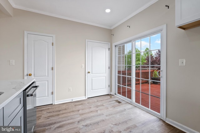 42038 Angel Arch Ter, Aldie, VA 20105 - unfurnished dining area with light wood-type flooring, ornamental molding, baseboards, and recessed lighting