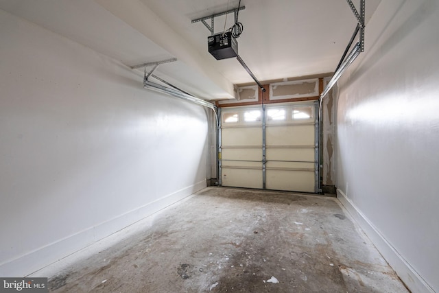 42038 Angel Arch Ter, Aldie, VA 20105 - garage with a garage door opener and baseboards