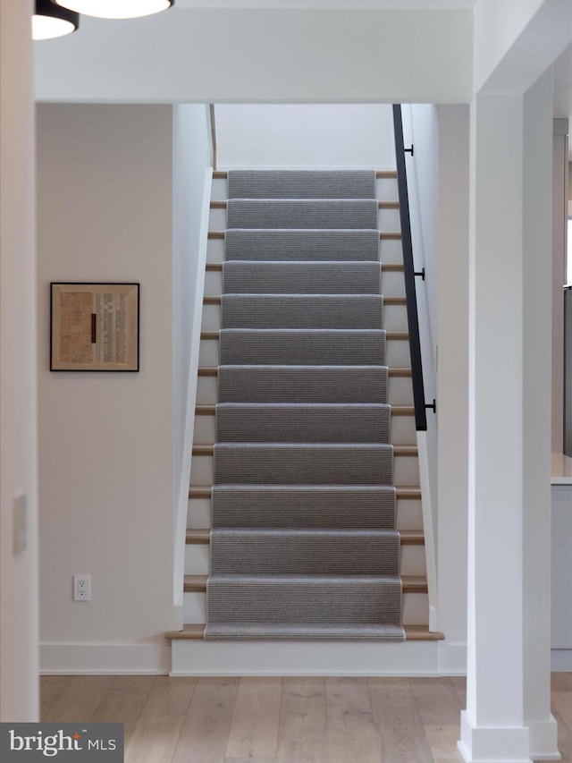 137 Cornwall Rd, Rehoboth Beach, DE 19971 - stairs featuring baseboards