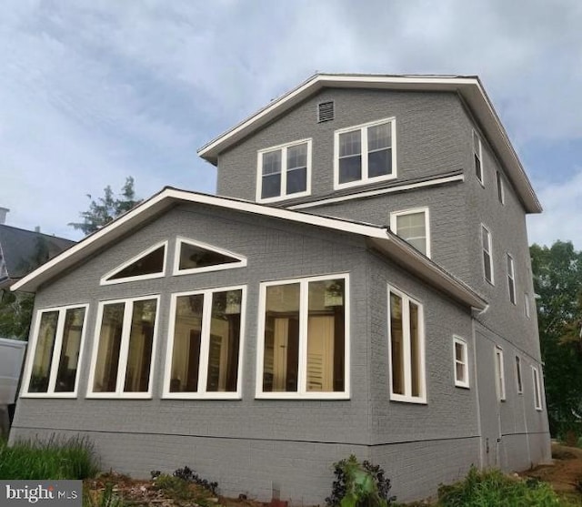4911 Bayard Blvd, Bethesda, MD 20816 - view of property exterior featuring crawl space and brick siding