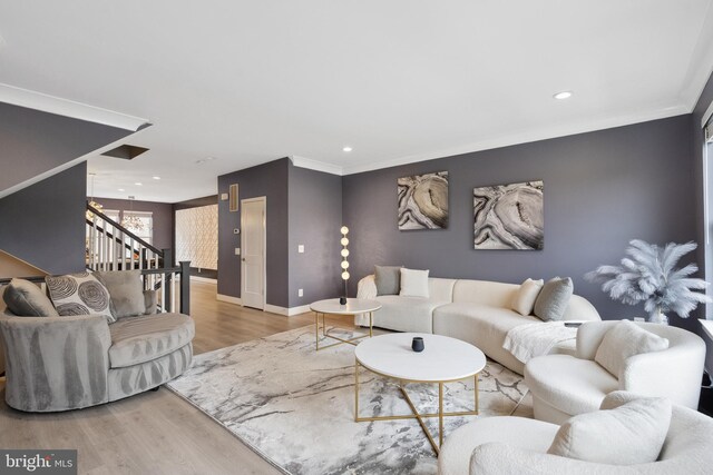 141 Center St S Unit 6, Vienna, VA 22180 - living area featuring wood finished floors, crown molding, baseboards, stairway, and recessed lighting