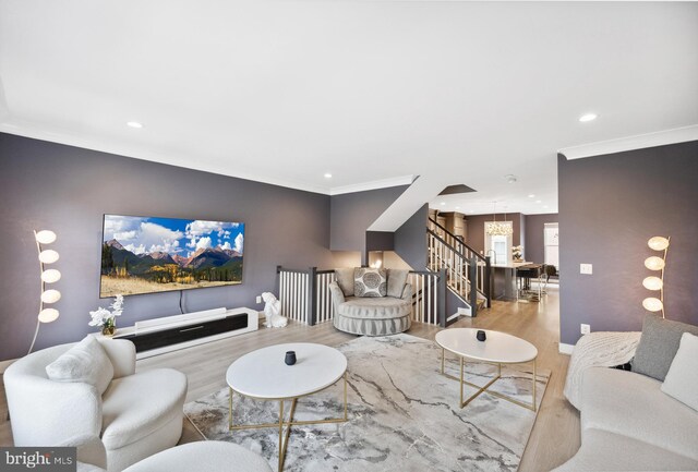 141 Center St S Unit 6, Vienna, VA 22180 - living area featuring wood finished floors, stairs, recessed lighting, crown molding, and baseboards
