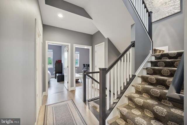 141 Center St S Unit 6, Vienna, VA 22180 - stairs with wood finished floors and recessed lighting