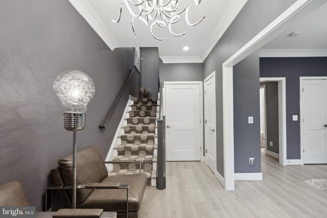 141 Center St S Unit 6, Vienna, VA 22180 - entryway with stairs, crown molding, wood finished floors, a chandelier, and baseboards