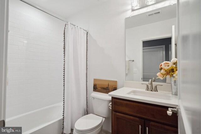 141 Center St S Unit 6, Vienna, VA 22180 - bathroom with toilet, vanity, and shower / bathtub combination with curtain