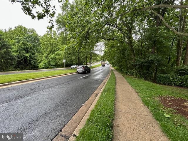 18500 Boysenberry Unit 145-51, Gaithersburg, MD 20879 - view of asphalt street featuring curbs and sidewalks