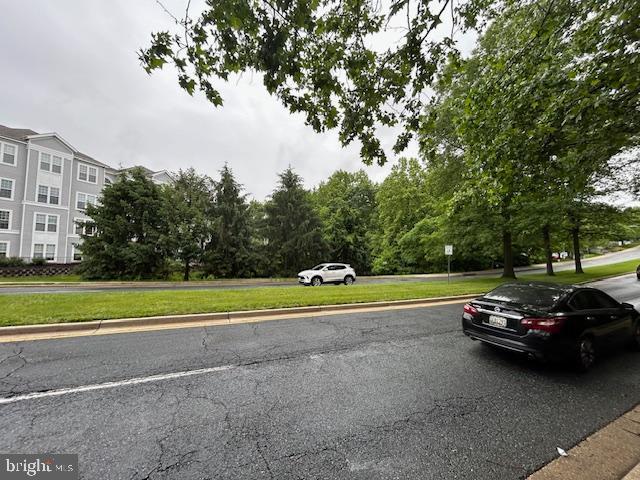 18500 Boysenberry Unit 145-51, Gaithersburg, MD 20879 - view of asphalt street featuring curbs and sidewalks