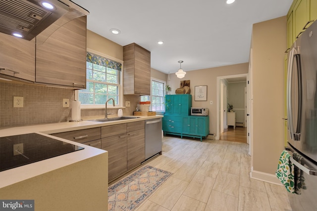 20720 Warfield Ct, Gaithersburg, MD 20882 - kitchen with appliances with stainless steel finishes, ventilation hood, decorative backsplash, light countertops, and recessed lighting