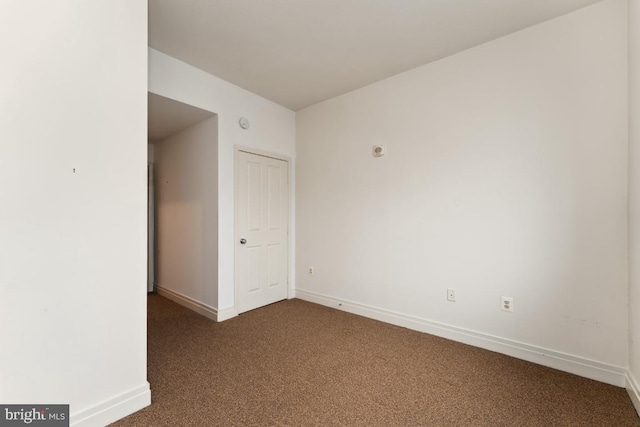 414 Water St Unit 3006, Baltimore, MD 21202 - empty room with dark carpet and baseboards