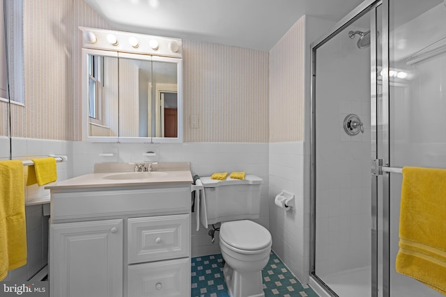 1301 N Harrison St Unit 708, Wilmington, DE 19806 - full bath featuring wallpapered walls, a wainscoted wall, tile walls, vanity, and a stall shower