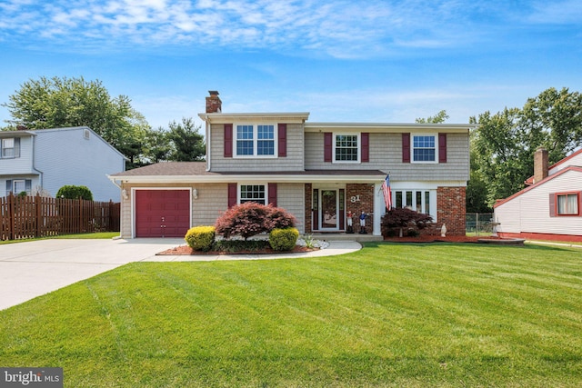 31 Bently Dr, Sewell, NJ 08080 - view of front facade with concrete driveway, an attached garage, and a chimney