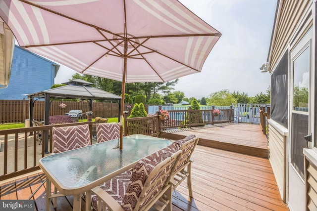 31 Bently Dr, Sewell, NJ 08080 - deck featuring outdoor dining space, a gazebo, and a fenced backyard