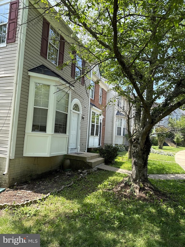 10749 Kitchener Ct, Bowie, MD 20721 - view of front facade with a front lawn