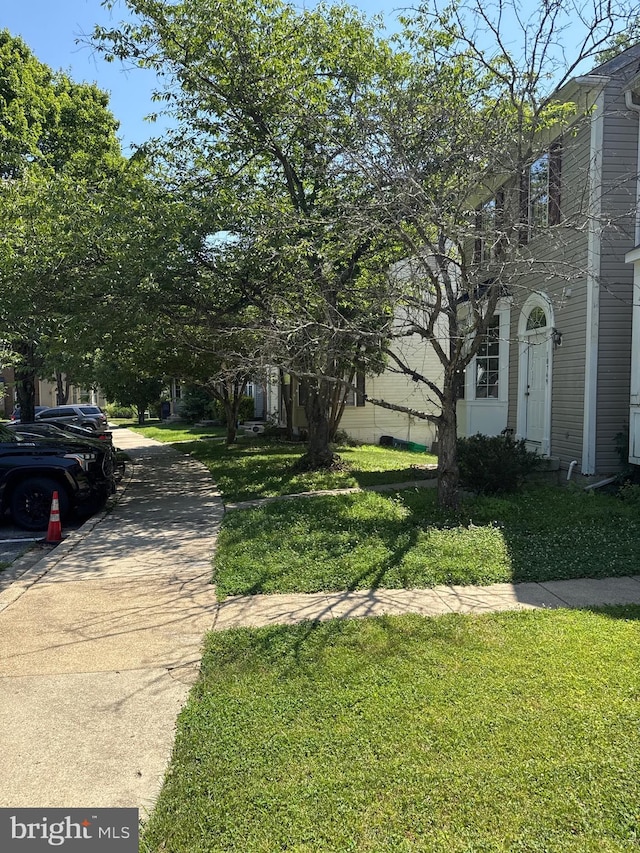 10749 Kitchener Ct, Bowie, MD 20721 - view of side of property with a yard