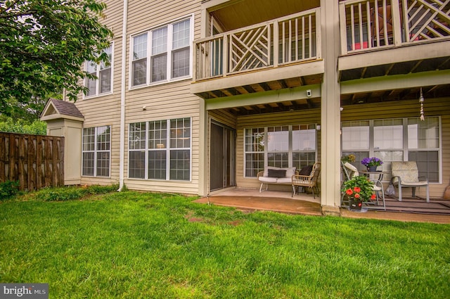 8060 Stonewall Brigade Ct Unit 101, Manassas, VA 20109 - rear view of property with a balcony