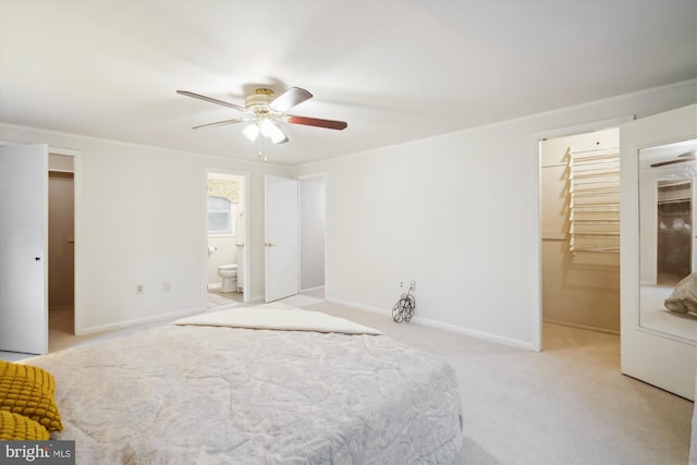 12804 Brunswick Ln, Bowie, MD 20715 - unfurnished bedroom featuring a spacious closet, a closet, light carpet, baseboards, and ensuite bathroom