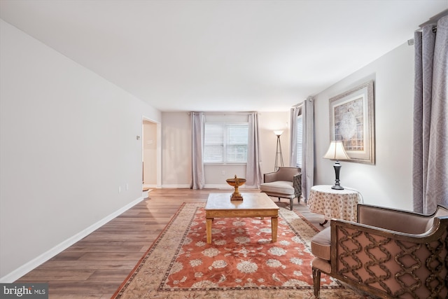 12804 Brunswick Ln, Bowie, MD 20715 - living area featuring wood finished floors and baseboards