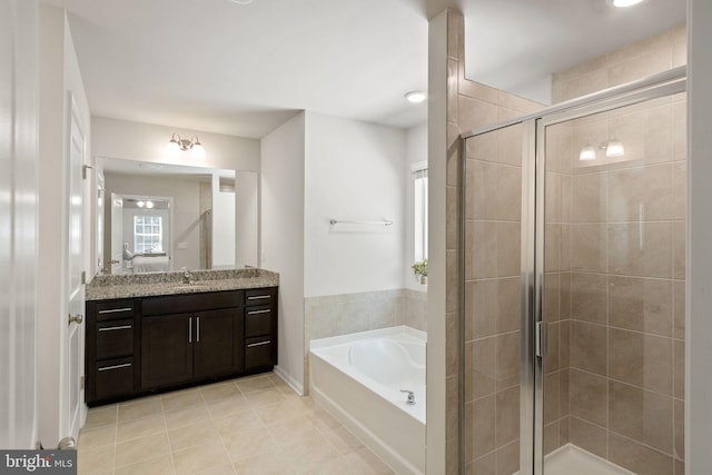 251 Rock Raymond Dr, Stafford, VA 22554 - bathroom featuring a bath, vanity, a stall shower, and tile patterned floors