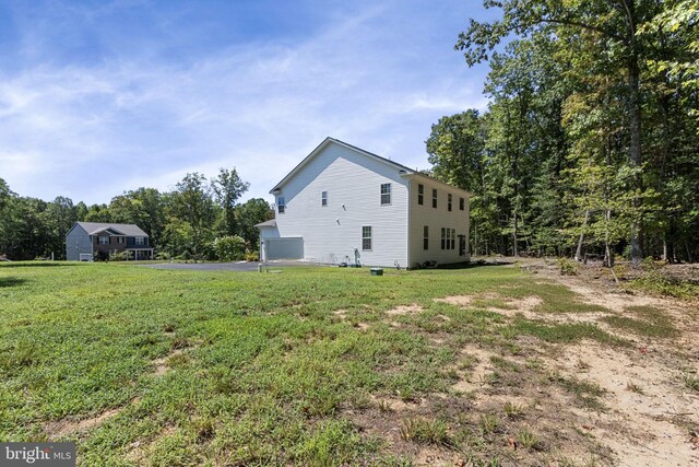 251 Rock Raymond Dr, Stafford, VA 22554 - view of side of home featuring a lawn