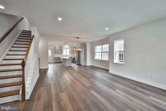 404 E 7th Ave Lot 3, Conshohocken, PA 19428 - unfurnished living room featuring stairs, baseboards, recessed lighting, dark wood-type flooring, and a chandelier