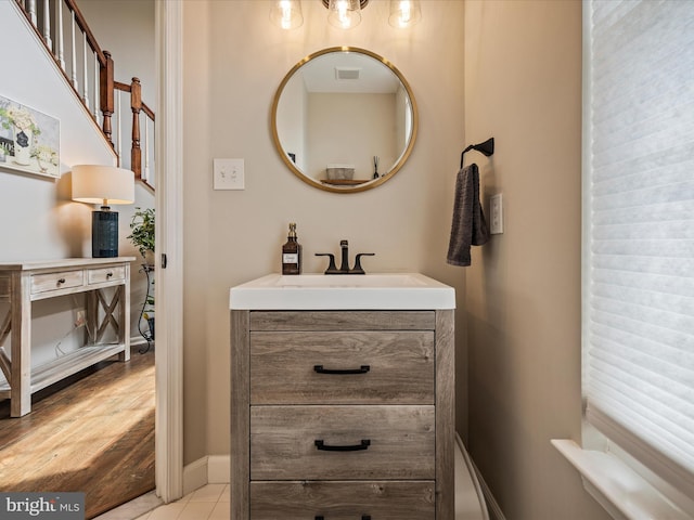21526 Golden Autumn Pl, Broadlands, VA 20148 - bathroom with vanity and tile patterned flooring