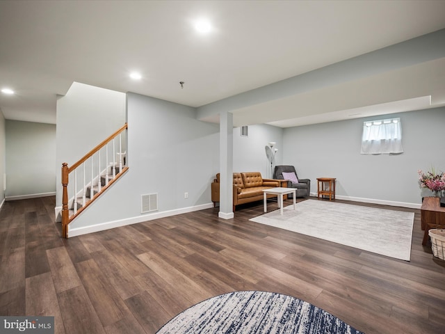 21526 Golden Autumn Pl, Broadlands, VA 20148 - living area featuring stairs, wood finished floors, and recessed lighting