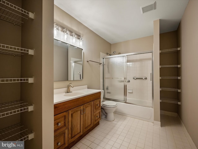 21526 Golden Autumn Pl, Broadlands, VA 20148 - full bath featuring vanity, bath / shower combo with glass door, and tile patterned floors