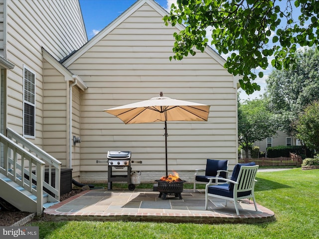 21526 Golden Autumn Pl, Broadlands, VA 20148 - view of patio / terrace with grilling area and an outdoor fire pit