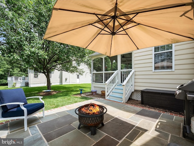 21526 Golden Autumn Pl, Broadlands, VA 20148 - view of patio / terrace with a fire pit